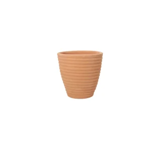 Maceta de diseño minimalista en color terracota, ideal para espacios modernos